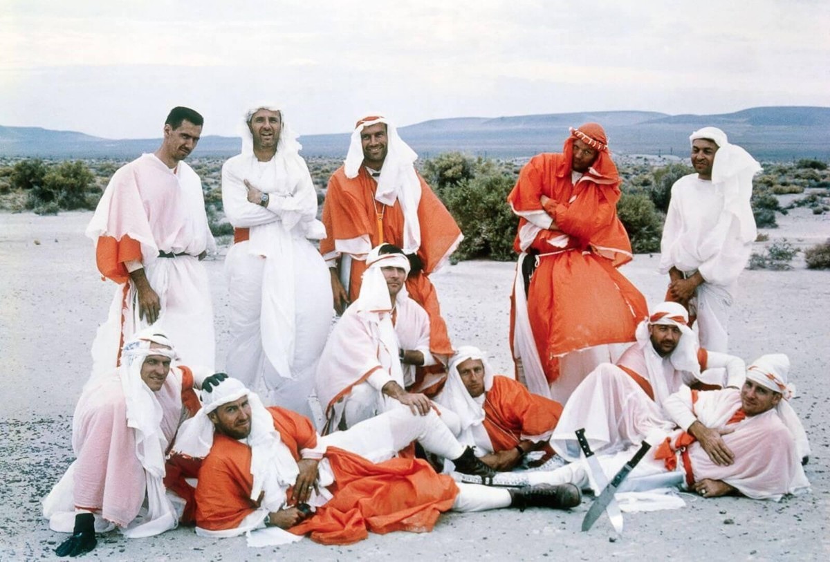 Desert Survival Training group: Astronauts pose during desert training east of Stead Air Force Base at the Carson Sink in Northern Nevada. August 1963.