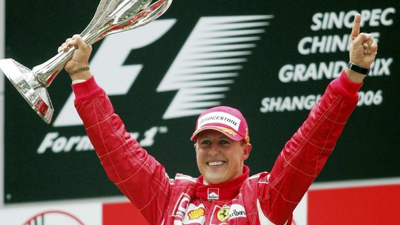 FILE - In this Oct. 1, 2006 file photo, Germany&#039;s Michael Schumacher celebrating winning the Formula One Chinese Grand Prix auto race at the Shanghai International Circuit in Shanghai, China. Sch ...
