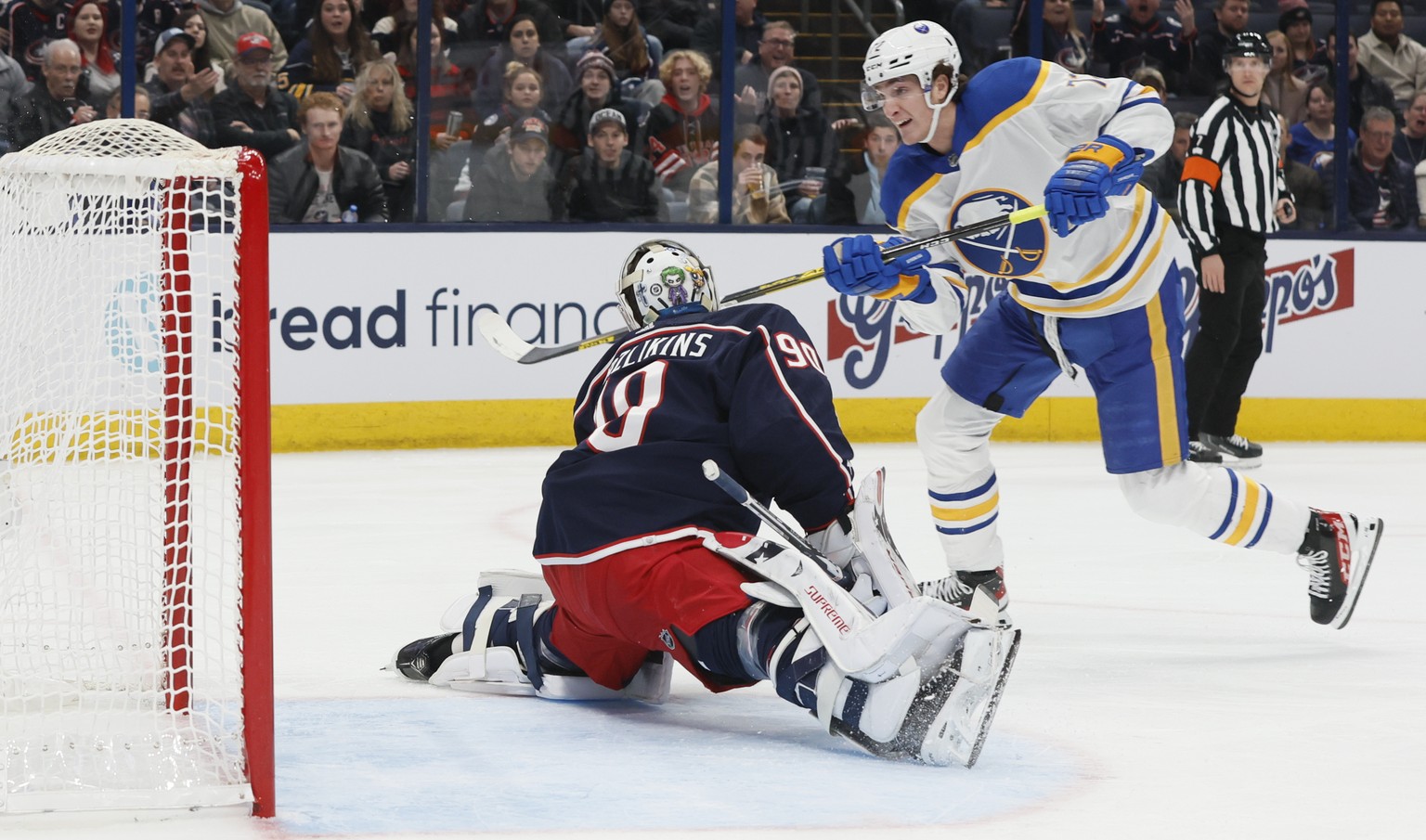 Buffalo Sabres&#039; Tage Thompson, right, scores a goal against Columbus Blue Jackets&#039; Elvis Merzlikins during the first period of an NHL hockey game Wednesday, Dec. 7, 2022, in Columbus, Ohio.  ...