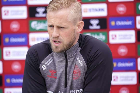Danish goalkeeper Kasper Schmeichel speaks to the media, in Elsinore, Denmark, Monday, June 14, 2021. Denmark played their opening Euro 2020 group game against Finland on Saturday when during the firs ...