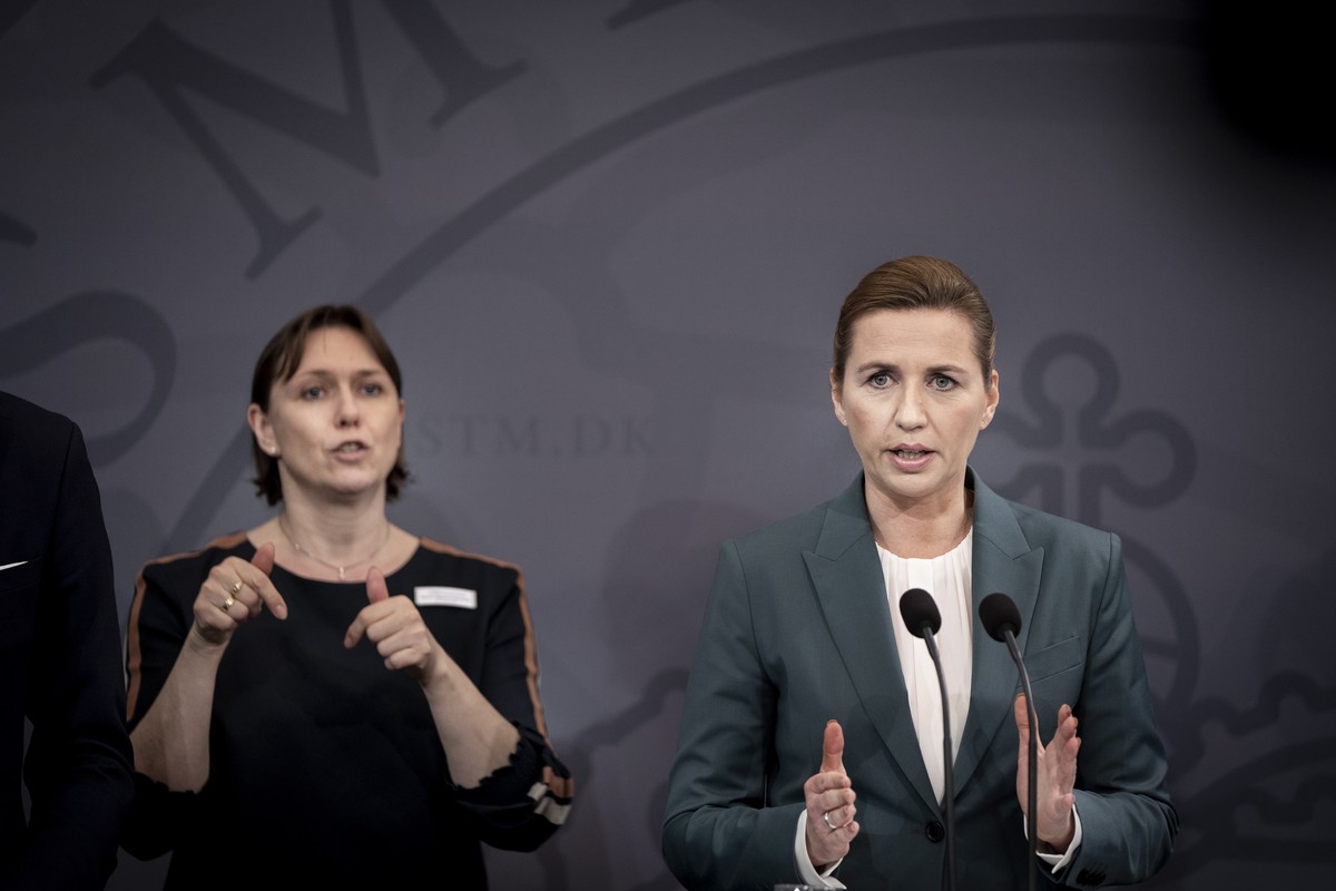 epa08283062 Danish Prime Minister Mette Frederiksen (R) holds a press briefing on the novel coronavirus Covid-19 situation, in Copenhagen, Denmark, 10 March 2020. Denmark announced on the day that it  ...