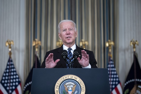 epa09566777 US President Joe Biden speaks on the October jobs report in the State Dining of the White House in Washington, DC, USA, on 05 November 2021. The US labor market got back on track last mont ...