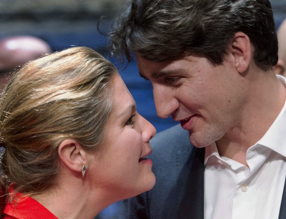 Canadian Prime Minister Justin Trudeau chats with his wife, Sophie Gregoire, after watching the Broadway musical &quot;Come From Away&quot; in New York on Wednesday, March 15, 2017. Trudeau, along wit ...