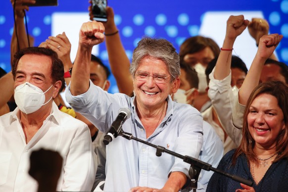 Guillermo Lasso, presidential candidate of Creating Opportunities party, CREO, speaks to supporters after a presidential runoff election at his campaign headquarters in Guayaquil, Ecuador, Sunday, Apr ...