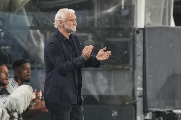 Germany&#039;s interim coach and sporting director Rudi Voeller celebrates at the end of the international friendly soccer match between Germany and France in Dortmund, Germany, Tuesday, Sept. 12, 202 ...