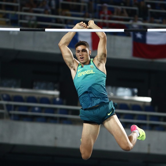 epa05488872 Thiago Braz da Silva of Brazil clears 6.03m in the Men&#039;s Pole Vault final of the Rio 2016 Olympic Games Athletics, Track and Field events at the Olympic Stadium in Rio de Janeiro, Bra ...