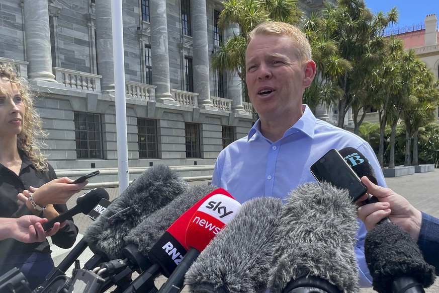New Zealand Education Minister Chris Hipkins talks to reporters outside parliament in Wellington, New Zealand, Saturday, Jan. 21, 2022. Hipkins is set to become New Zealand&#039;s next prime minister  ...