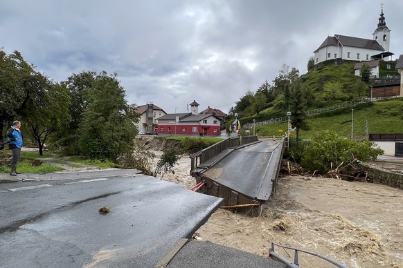 A collapsed bridge is seen in village Stahovica, near the town of Kamnik, Slovenia, Friday, Aug. 4, 2023. Slovenia has faced the worst-ever natural disaster in its history, Prime Minister Robert Golob ...