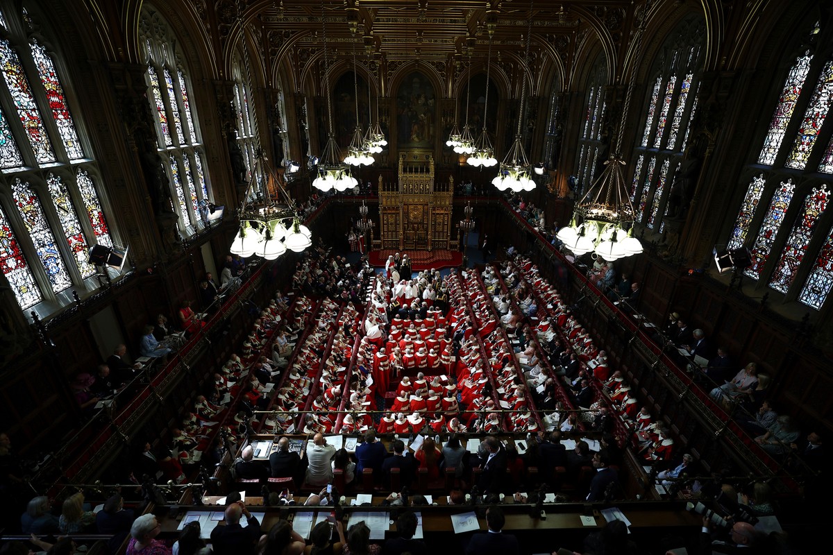 FILE - Members of the House of Lords and guests take their seats in the Lords Chamber, ahead of the State Opening of Parliament, in the Houses of Parliament, in London, July 17, 2024. (Henry Nicholls/ ...
