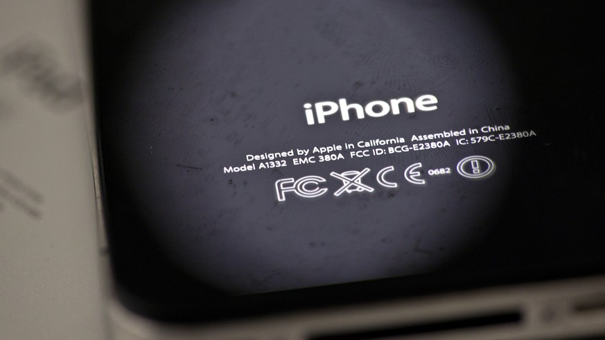 FILE- In this Thursday, Dec. 6, 2012, photo, the back of an iPhone 4 in New York. Apple is apologizing for secretly slowing down older iPhones, which it says was necessary to avoid unexpected shutdown ...