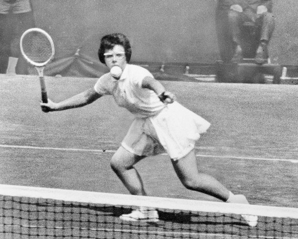 Unusual angle makes it appear ball has hit Billie Jean Moffitt in the face in her match against Nancy Richey in the National Tennis Championship on Sept. 11, 1964 at Forest Hills, N.Y. Billie Jean, fr ...