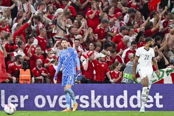 Switzerland&#039;s goalkeeper Gregor Kobel reacts after the 1-0 during the UEFA Nations League Group D leg 1 soccer match between Denmark and Switzerland, on Thursday, September 5, 2024, at the Parken ...