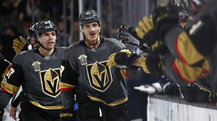 Vegas Golden Knights defenseman Luca Sbisa (47) celebrates after scoring against the Winnipeg Jets during the first period of an NHL hockey game Friday, Nov. 10, 2017, in Las Vegas. (AP Photo/John Loc ...