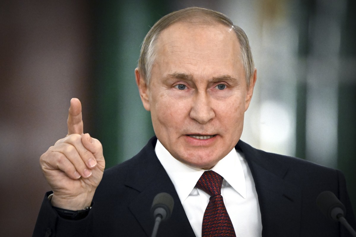 FILE - Russian President Vladimir Putin gestures while speaking at a news conference following a meeting of the State Council at the Kremlin in Moscow, Russia on Dec. 22, 2022. Russia's economy h ...