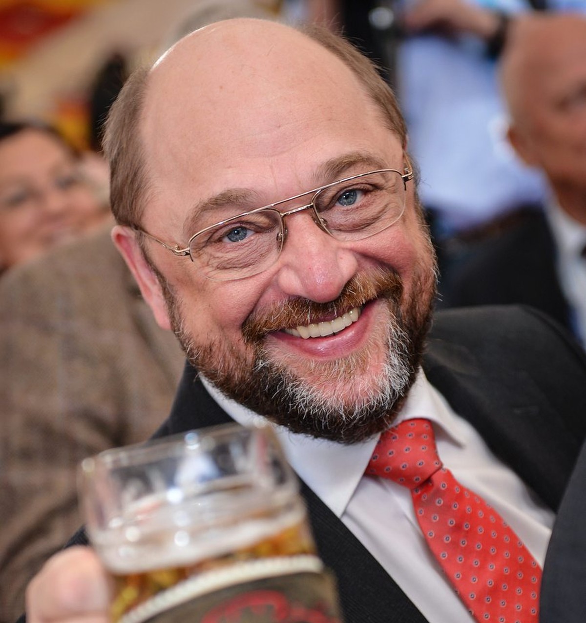 epa04110426 EU Parliament President Martin Schulz, top candidate for the European elections of the German Social Democrats (SPD) drinks beer during his party's 'Political Ash Wednesday' ...