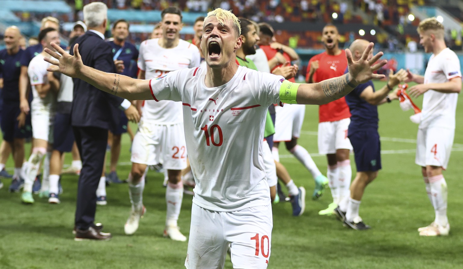 Switzerland&#039;s Granit Xhaka celebrates end of the Euro 2020 soccer championship round of 16 match between France and Switzerland at the National Arena stadium, in Bucharest, Romania, Tuesday, June ...