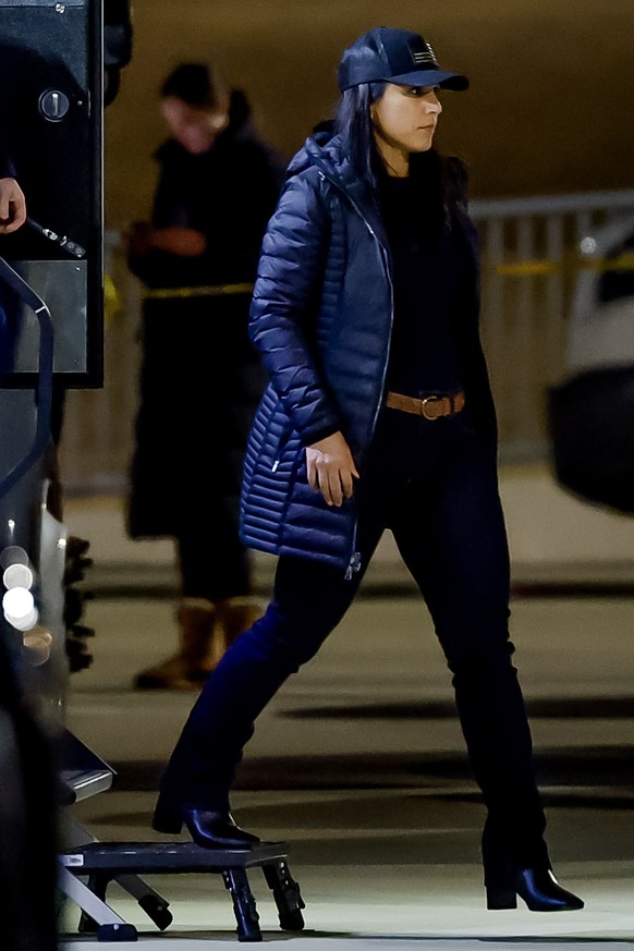 epa12689662 Tulsi Gabbard (L), US Director of National Intelligence, arrives as the FBI conducts a 'court-ordered search warrant' at the Fulton County Department of Registration and Election ...