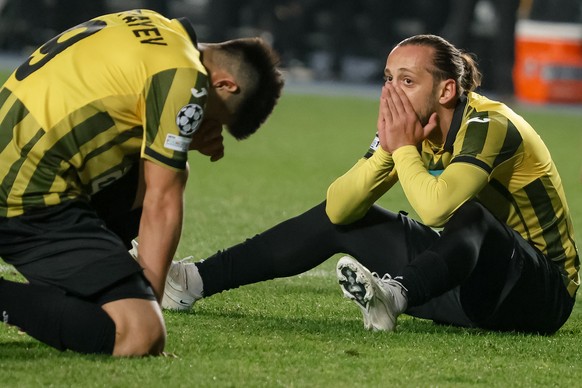 Kairat&#039;s Giorgi Zaria, right, reacts after failing to score during the Champions League opening phase soccer match between Kairat Almaty and Pafos FC in Almaty, Kazakhstan, Tuesday, Oct. 21, 2025 ...
