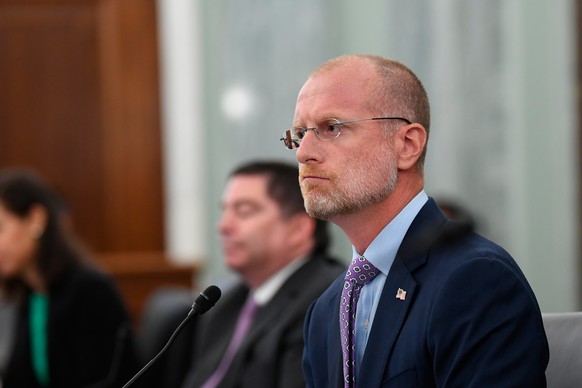 FILE - Brendan Carr listens during a Senate Commerce, Science, and Transportation committee hearing to examine the Federal Communications Commission on Capitol Hill in Washington, June 24, 2020. (Jona ...