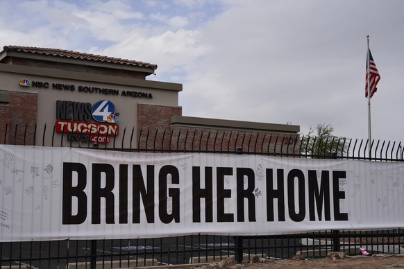 A banner reading "Bring her home" on a fence outside of the KVOA news station in Tucson, Ariz., on Friday, Feb. 13, 2026. (AP Photo/Ty ONeil)
Savannah Guthrie Mom Missing