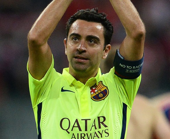 epa04745427 FC Barcelona&#039;s Xavi Hernandez applauds supporters after the UEFA Champions League semi final second leg soccer match between FC Bayern Munich and FC Barcelona in Munich, Germany, 12 M ...