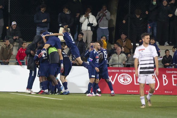 Etoile Carouge&#039;s players celebrate their goal after scoring the 1:0, during the Swiss Cup Round of 16 between Etoile Carouge FC and FC Basel, at the Stade de la Fontenette, in Carouge, Switzerlan ...