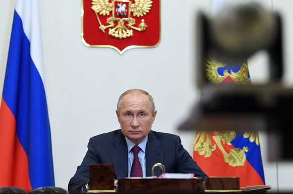 Russian President Vladimir Putin attends a meeting on coronavirus today at the Novo-Ogaryovo residence outside Moscow, Russia, Wednesday, Nov. 18, 2020. (Alexei Nikolsky, Sputnik, Kremlin Pool Photo v ...