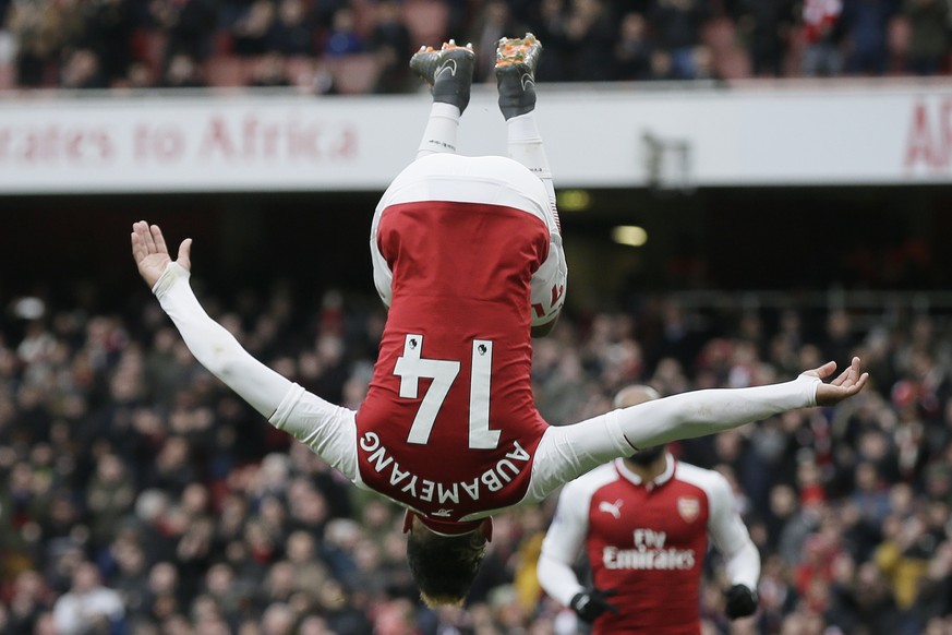 Arsenal&#039;s Pierre-Emerick Aubameyang celebrates after scoring a penalty during the English Premier League soccer match between Arsenal and Stoke City at the Emirates Stadium in London, Sunday, Apr ...