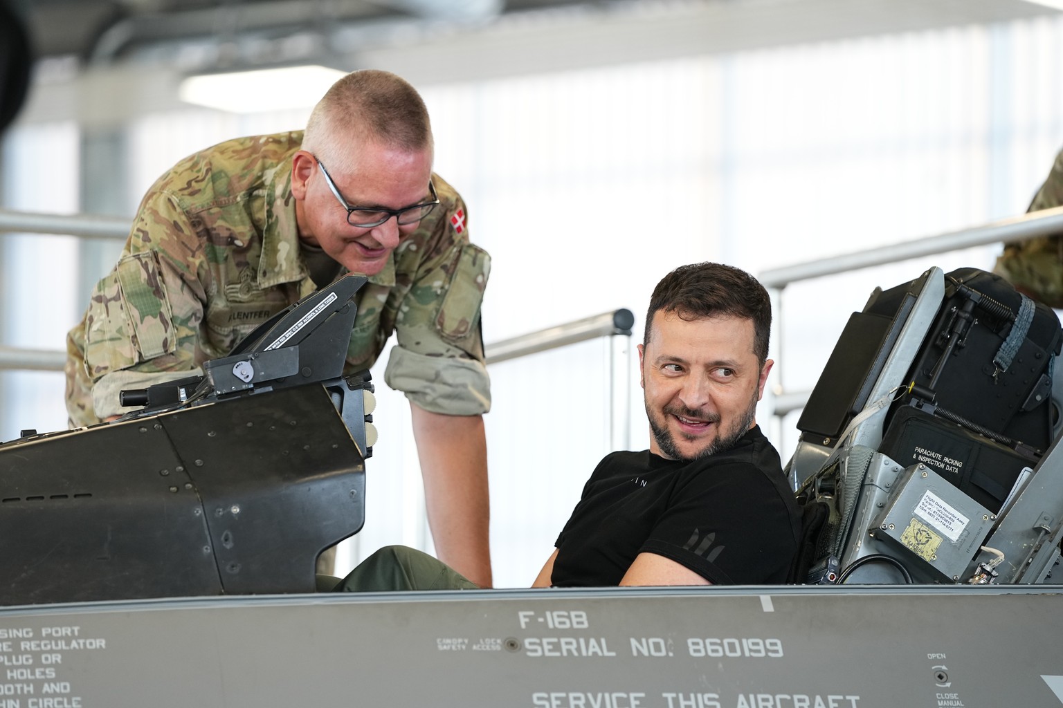 Ukrainian President Volodymyr Zelenskyy sits in a F-16 fighter jet at Skrydstrup Airbase, in Vojens, Denmark, Sunday, Aug. 20, 2023. (Mads Claus Rasmussen/Ritzau Scanpix via AP)