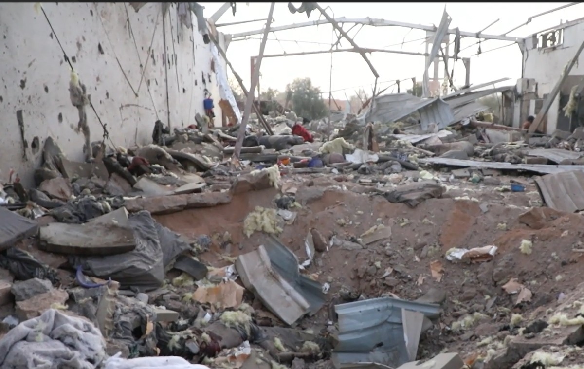 epa12059885 A handout screen grab taken from a video released by Houthis-run al-Masirah TV shows a view of a detention facility allegedly struck by US airstrikes in the northern province of Saada, Yem ...