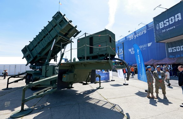 epa12960881 A Romanian Army MIM-104 Patriot surface-to-air missile and air defense system is displayed during the final day of the Black Sea Defense and Aerospace Exhibition 2026 in Bucharest, Romania ...