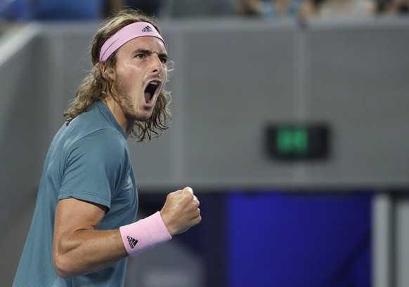 Greece&#039;s Stefanos Tsitsipas celebrates after winning the first set against Georgia&#039;s Nikoloz Basilashvili during their third round match at the Australian Open tennis championships in Melbou ...