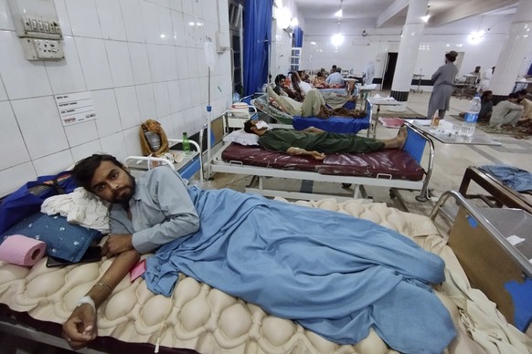 Injured victims of rain storm are treated at a hospital, in Bannu, a town of Pakistan&#039;s Khyber Pakhtunkhwa province, Saturday, June 10, 2023. Heavy rains swept through Pakistan&#039;s northwest o ...