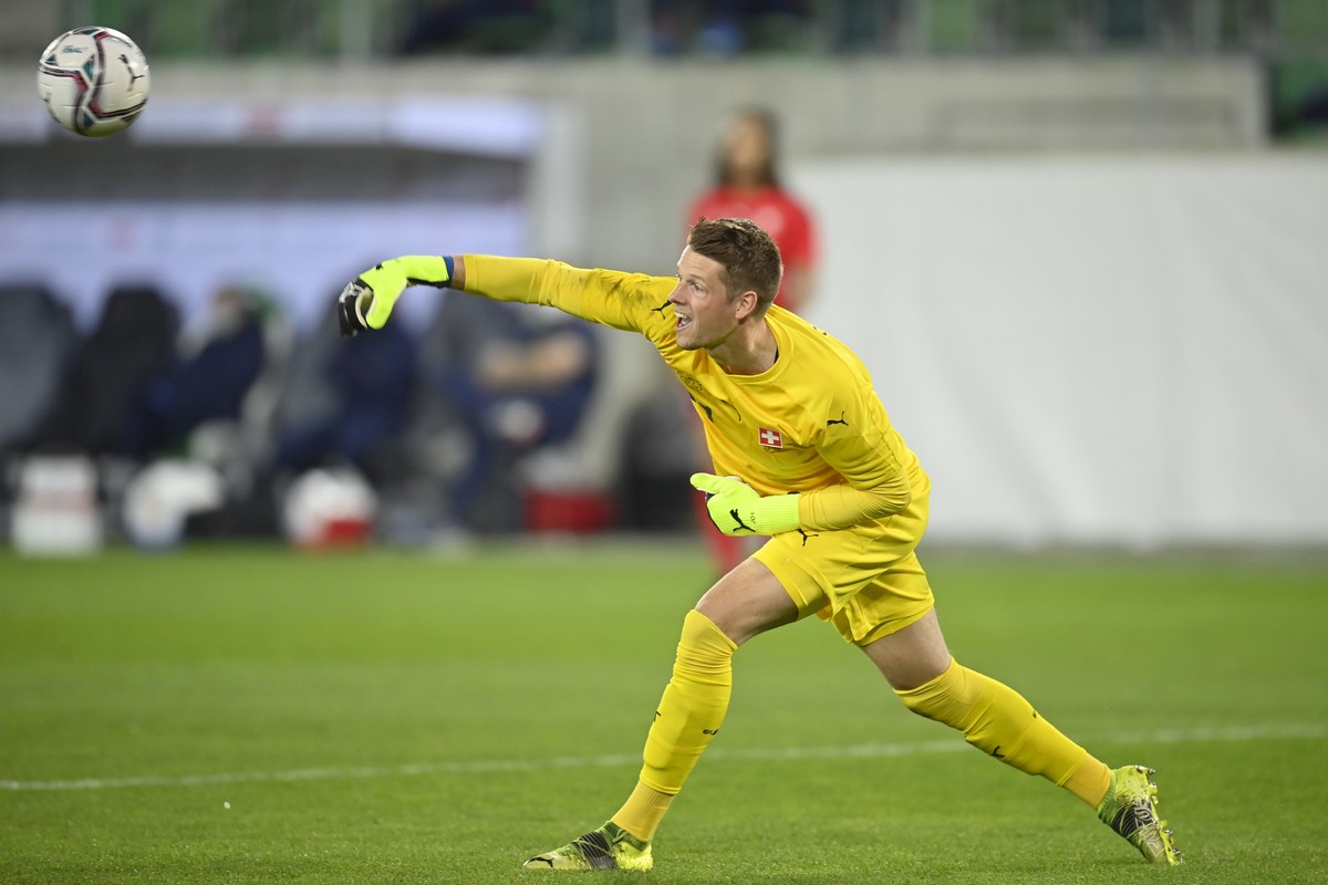 epa09109041 Switzerland's goalkeeper Jonas Omlin in action during the International Friendly soccer match between Switzerland and Finland in St. Gallen, Switzerland, 31 March 2021. EPA/GIAN EHREN ...