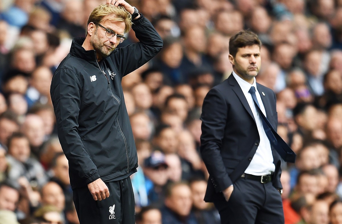 epa07557676 (FILE) - Liverpool manager Juergen Klopp (L) and Tottenham manager Mauricio Pochettino (R) during their team's 0-0 draw in the English Premier League soccer match between Tottenham Ho ...