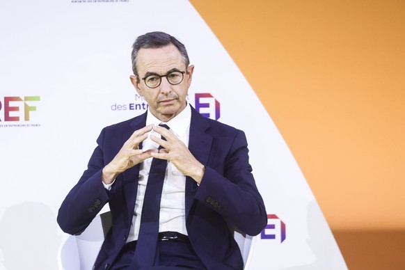 epa12330279 French Minister of the Interior Bruno Retailleau speaks during the conference &#039;Can France stay in the game&#039; at the French employers? federation MEDEF Summer Conference, La REF 20 ...