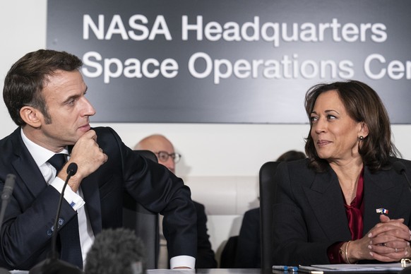 French President Emmanuel Macron, left, and Vice President Kamala Harris speak at a meeting to highlight space cooperation between the two countries, at NASA Headquarters in Washington, Wednesday,…