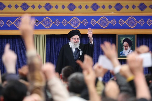 epa12622683 A handout picture made available by Iran's Supreme Leader Office shows Ayatollah Ali Khamenei greeting a crowd during a ceremony in Tehran, Iran, 03 January 2026. Khamenei commented o ...