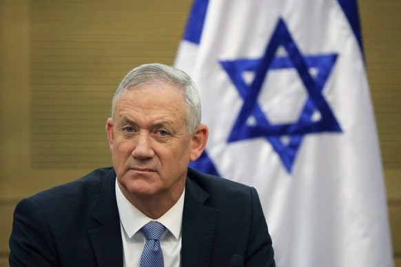 epa08005803 Leader of the Blue and White Party Benny Gantz during an extended faction meeting of the right-wing bloc members at the Israeli Knesset (parliament) in Jerusalem, Israel, 18 November 2019. ...
