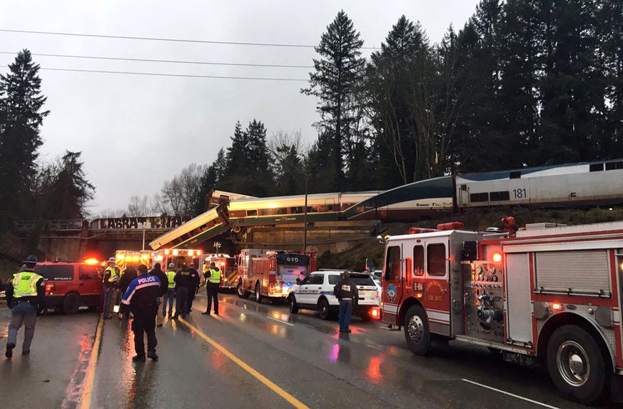 This photo provided by Washington State Patrol shows an Amtrak train that derailed south of Seattle on Monday, Dec. 18, 2017. Authorities reported &quot;injuries and casualties.&quot; The train derail ...