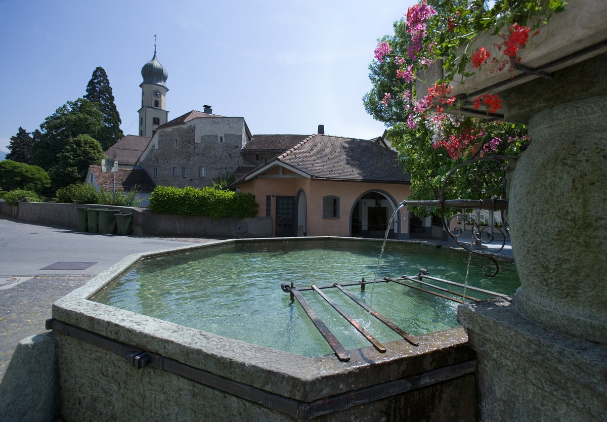 A square with a fountain in Maienfeld, Switzerland, pictured on May 30, 2005. In Heididorf above Maienfeld, visitors from all over the world can go back to the time of origin of Johanna Spyri's w ...