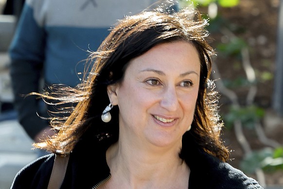 FILE - This April 4, 2016 file photo shows Maltese investigative journalist Daphne Caruana Galizia, who was killed by a car bomb in Malta on Oct. 16, 2017. Maltese authorities say a man arrested in a  ...