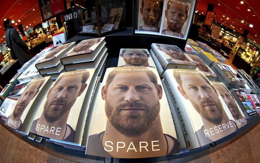 Copies of the new book requested by Prince Harry "Save" are on display at a bookstore in Berlin, Germany, Tuesday, January 10, 2023. Prince Harry's memoirs "Save" went on sale in bookstore...