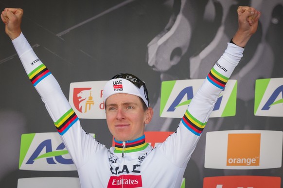 epa12058505 First placed Slovenian cyclist Tadej Pogacar of UAE Team Emirates XRG celebrates on the podium for the Liege Bastogne Liege cycling classic race for Elite Men over 252 km from Liege to Lie ...