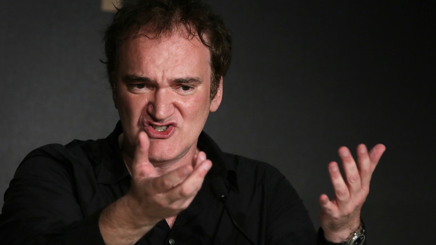 Director Quentin Tarantino speaks during a press conference at the 67th international film festival, Cannes, southern France, Friday, May 23, 2014. (AP Photo/Virginia Mayo)