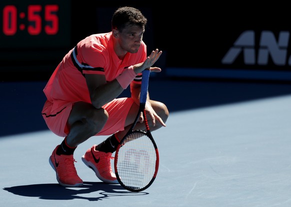 Bulgaria&#039;s Grigor Dimitrov crouches down while playing Austria&#039;s Dennis Novak during their first round match at the Australian Open tennis championships in Melbourne, Australia, Monday, Jan. ...