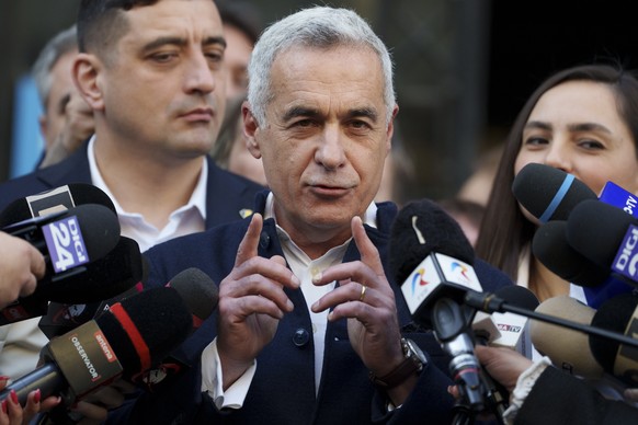 Calin Georgescu, the winner of the first round of presidential elections, later annulled by the Constitutional Court, speaks to media after registering his new bid for the country&#039;s presidency ou ...