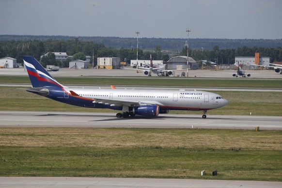 FILE - The Aeroflot Airbus A330 plane taxies out at Sheremetyevo airport, Moscow, Monday, June 24, 2013. Delta Air Lines has suspended its partnership with Russian national airline Aeroflot following  ...