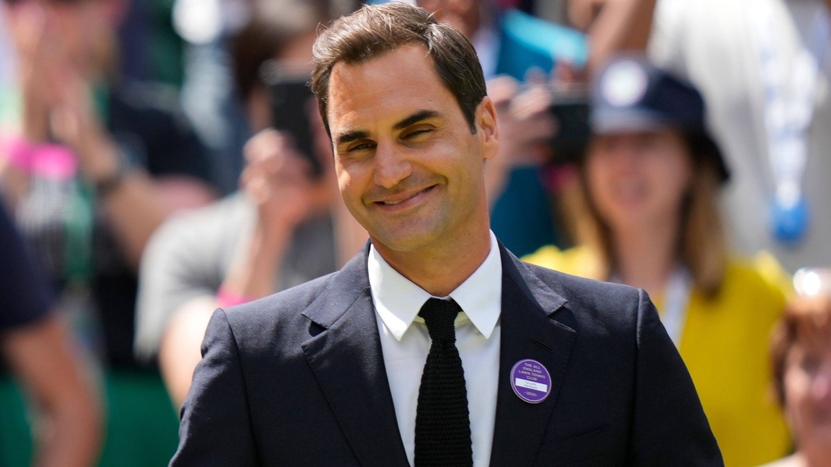 Mandatory Credit: Photo by Dave Shopland/Shutterstock 13012855bz Roger Federer on Centre Court as part of the centenary celebrations Wimbledon Tennis Championships, Day 7, The All England Lawn Tennis  ...