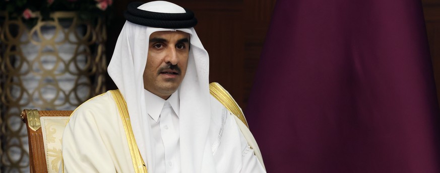 epa10240262 Emir of Qatar Sheikh Tamim Bin Hamad Al-Thani attends a meeting with Russian President Vladimir Putin (not pictured), on the sidelines of the 6th Summit of the Conference on Interaction an ...